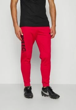 Nike Performance FC LIBERO PANT - Tracksuit Bottoms - Mystic Hibiscus/black