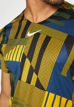 Nike Performance ADVANTAGE - Sports T-shirt - Yellow Ochre/white -Nike Performance store 0125f6be0df145ef89a6162f98251acf