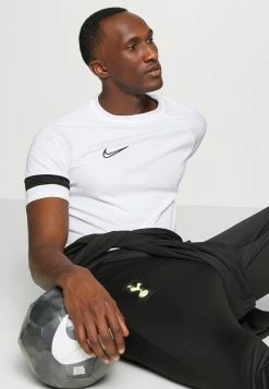 Nike Performance TOTTENHAM HOTSPURS STRIKE TRACK PANT - Club Wear - Black/volt -Nike Performance store 0218fce4bf4d401fbbefc594da096ac3