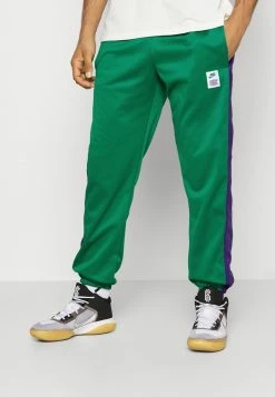 Nike Performance STARTING 5 PANT - Tracksuit Bottoms - Malachite/court Purple/malachite