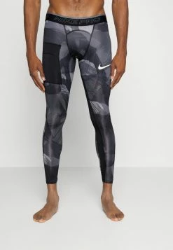 Nike Performance CAMO - Leggings - Black/coconut Milk