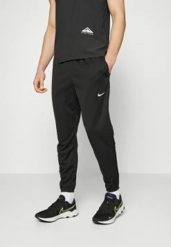 Nike Performance PANT - Tracksuit Bottoms - Black/reflective Silver