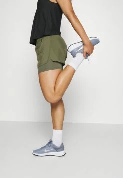 Nike Performance SHORT - Sports Shorts - Medium Olive -Nike Performance store 0a19b7dae81847de954025c6d1864891