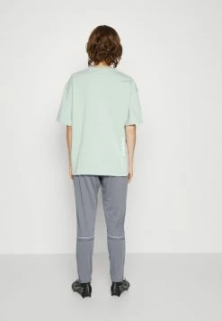 Nike Performance ACADEMY PANT - Tracksuit Bottoms - Smoke Grey/white -Nike Performance store 0f2abd02112e41e9a703996739703ff0