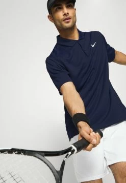 Nike Performance SOLID - Polo Shirt - Obsidian/white -Nike Performance store 0f4f52450e6940c3806a9cbcf221b2a9