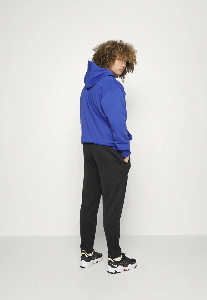 Nike Performance NBA MIAMI HEAT MOMENTS MIXTAPES SHOWTIME PANT - Tracksuit Bottoms - Black/sundial/white 3 Nike Performance NBA MIAMI HEAT MOMENTS MIXTAPES SHOWTIME PANT - Tracksuit Bottoms - Black/sundial/white - Image 3