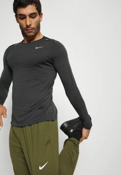 Nike Performance PANT - Tracksuit Bottoms - Rough Green/reflective Silver 9 Nike Performance PANT - Tracksuit Bottoms - Rough Green/reflective Silver -Nike Performance store 130a6347a59544f9986ea343c926a0e8