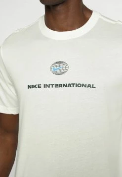 Nike Performance TEE HERITAGE - Sports T-shirt - Sail -Nike Performance store 13bbccbc77e84603a360371cd2b5852a