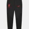 Nike Performance LIVERPOOL STRIKE PANT UNISEX - Tracksuit Bottoms - Black/siren Red
