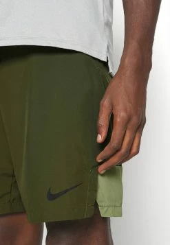 Nike Performance SHORT - Sports Shorts - Rough Green Alligator/black -Nike Performance store 155485656db04ed7abab31d05efbed28