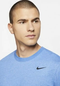 Nike Performance SOLID - Sports T-shirt - Light Game Royal Heather/black -Nike Performance store 1adb9f026e5a45a7b9b7f0104d5ba25a