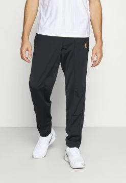 Nike Performance HERITAGE SUIT PANT - Tracksuit Bottoms - Black