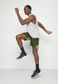 Nike Performance SHORT - Sports Shorts - Rough Green Alligator/black -Nike Performance store 1bec8fe126b14c3b93a889c43715de63