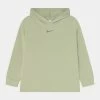 Nike Performance YOGA - Hoodie - Olive Aura
