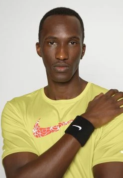 Nike Performance MILER - Sports T-shirt - Celery -Nike Performance store 1c38389f3ea64827bc60f754871d917b