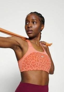 Nike Performance BRA - Medium Support Sports Bra - Madder Root/madder Root/white -Nike Performance store 1d66db5a926f4ab9b2c1bb3797f5b226