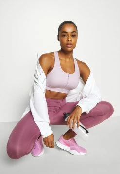 Nike Performance ZIP FRONT BRA - Medium Support Sports Bra - Regal Pink/white -Nike Performance store 1ee20d8dc2f845edb8efbb6126feff0d
