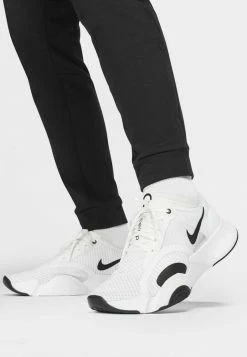 Nike Performance PANT TAPER - Tracksuit Bottoms - Black/white 10 Nike Performance PANT TAPER - Tracksuit Bottoms - Black/white -Nike Performance store 21b579ca6a5945ddb1fcde48c89ed80c