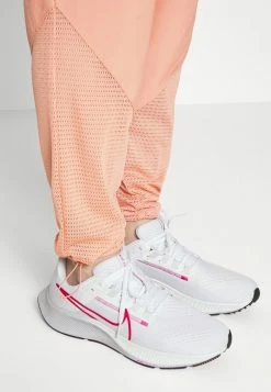 Nike Performance RUN PANT - Tracksuit Bottoms - Madder Root -Nike Performance store 28eff2d025224978a5080b27777004a1