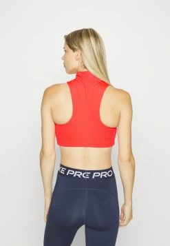 Nike Performance AIR MOCKZIP BRA - Medium Support Sports Bra - Light Crimson/oxen Brown -Nike Performance store 2930824964c34c88a8e50596b4ad7c79