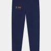 Nike Performance FC BARCELONA TRAVEL PANT UNISEX - Tracksuit Bottoms - Blue Void/blue Void/vivid Orange