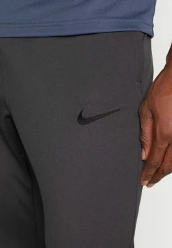 Nike Performance TOTTENHAM HOTSPURS STRIKE TRACK PANT - Tracksuit Bottoms - Medium Ash/black -Nike Performance store 2afd4d67075441ddbcd7fdcb7792ea9b