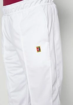 Nike Performance HERITAGE SUIT PANT - Tracksuit Bottoms - White -Nike Performance store 2bb74e94f64145e68f97a9c3b282abca