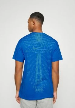 Nike Performance BURNOUT - Sports T-shirt - Light Photo Blue/black -Nike Performance store 2be1750c12034364aad9755bdf8c08f6