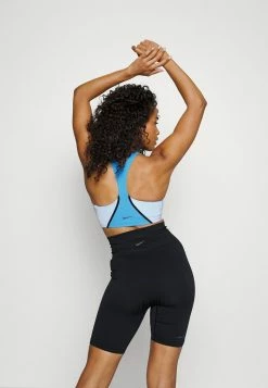 Nike Performance BRA - Medium Support Sports Bra - Coast/light Marine -Nike Performance store 2e78d79e8a9f49fd8517c33c50096abf