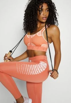 Nike Performance BRA - Medium Support Sports Bra - Madder Root/atmosphere -Nike Performance store 2f2b033a070c48cca7998057176131e2