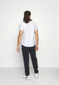 Nike Performance HERITAGE SUIT PANT - Tracksuit Bottoms - Black -Nike Performance store 300eec9348a241bfb96b07781138f7a8