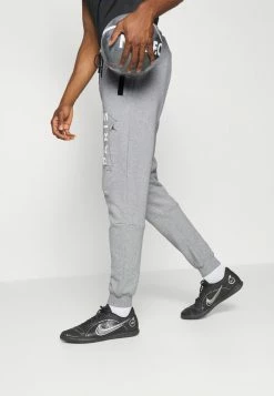 Nike Performance JORDAN X PARIS ST GERMAIN PANT - Tracksuit Bottoms - Dark Grey Heather/white -Nike Performance store 31799b8ae00241b0bfe7656b6c94c561
