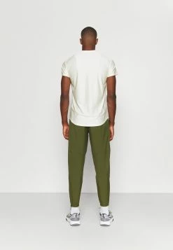 Nike Performance PANT - Tracksuit Bottoms - Rough Green -Nike Performance store 346c8e9241e244fcb95ce10843e7781d