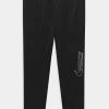 Nike Performance UNISEX - Tracksuit Bottoms - Black