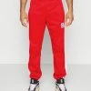 Nike Performance STARTING 5 PANT - Tracksuit Bottoms - University Red/white