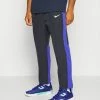 Nike Performance ADVANTAGE PANT - Tracksuit Bottoms - Black