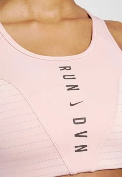 Nike Performance BRA - Medium Support Sports Bra - Pink Oxford/black -Nike Performance store 3c8e9ddf4a374e3e92243958cbd95f8e