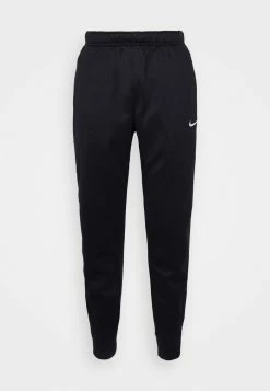Nike Performance PANT TAPER - Tracksuit Bottoms - Black/white -Nike Performance store 3cb458bfc4774dddb0e96a41131152c7