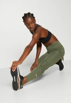 Nike Performance ONE - Leggings - Medium Olive/white -Nike Performance store 3d58b6f05298483abe290bd9ff22f521