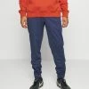 Nike Performance FC TRIBUNA PANT - Tracksuit Bottoms - Midnight Navy/black