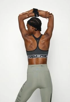 Nike Performance LOGO BRA - Medium Support Sports Bra - Black/white -Nike Performance store 3e66ae4af29143029e3ebdd53f727488