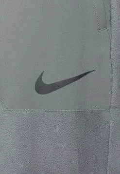 Nike Performance WNTRIZED PANT - Tracksuit Bottoms - Iron Grey/black -Nike Performance store 3f9cc16d3dbb4412a750a3b9ff4c3cf9