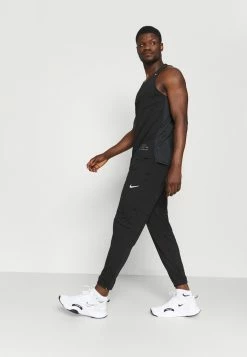 Nike Performance PANT - Tracksuit Bottoms - Black 10 Nike Performance PANT - Tracksuit Bottoms - Black -Nike Performance store 42b907871445478ca24fb5e0142d7bbd