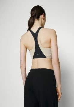 Nike Performance BRA - Medium Support Sports Bra - Black/sanddrift/iron Grey -Nike Performance store 448ce770dd5c40618c307fead3ce9f96