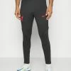 Nike Performance LIVERPOOL FC STRIKE PANT - Tracksuit Bottoms - Black/siren Red