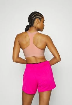 Nike Performance SEAMLESS BRA - Medium Support Sports Bra - Light Madder Root White -Nike Performance store 45a5843ad0854564b0922f4b016733f9