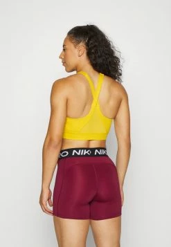 Nike Performance WRAP BRA - Medium Support Sports Bra - Yellow Ochre/yellow Ochre/gold Suede/(white) -Nike Performance store 46c9a205f93640c0a68d3e58b3ca0ded
