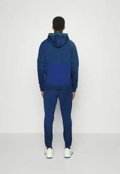 Nike Performance BRASIL CBF TRAVEL PANT - National Team Wear - Coastal Blue/green Spark/dynamic Yellow -Nike Performance store 48b776af81f940dda7930ce18f1f4c38