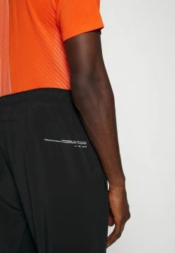 Nike Performance DRY PANT - Tracksuit Bottoms - Black/cinnabar -Nike Performance store 48bebd4065484db3912dbb71837aeef0