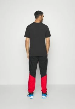 Nike Performance NBA CHICAGO BULLS STATEMENT PANT - Club Wear - University Red/black -Nike Performance store 4a3692b5a03041c9b89535b930b07a11